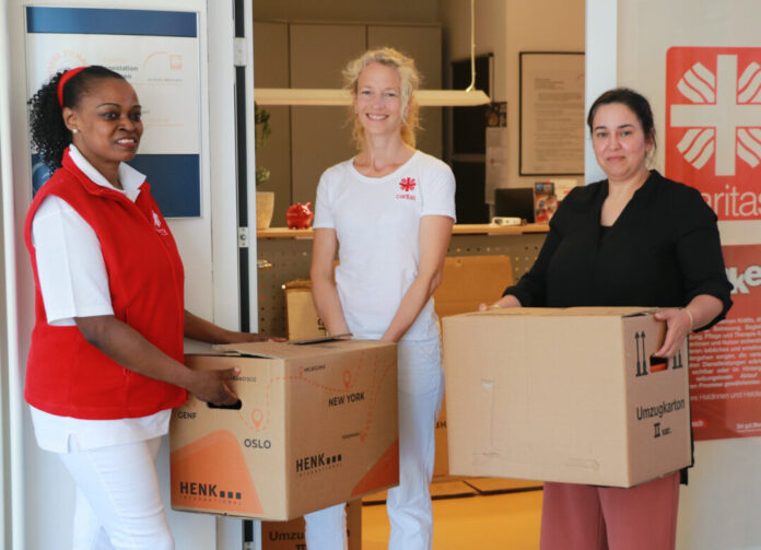 Die Pflegekräfte Christine Ropertz und Simone Calderola sowie Leitung Mimouna Marzouki. Foto: Caritas