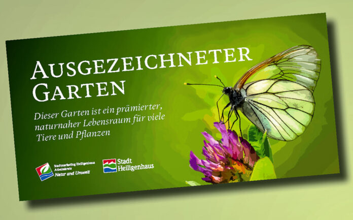 Prämierter Garten mit Schmetterling auf Blüte.