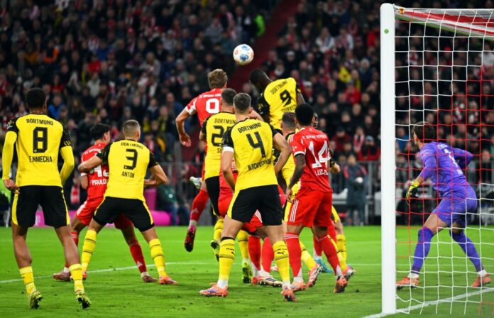 Harry Kane (hinten, Mitte l) brachte den FC Bayern früh in Führung.