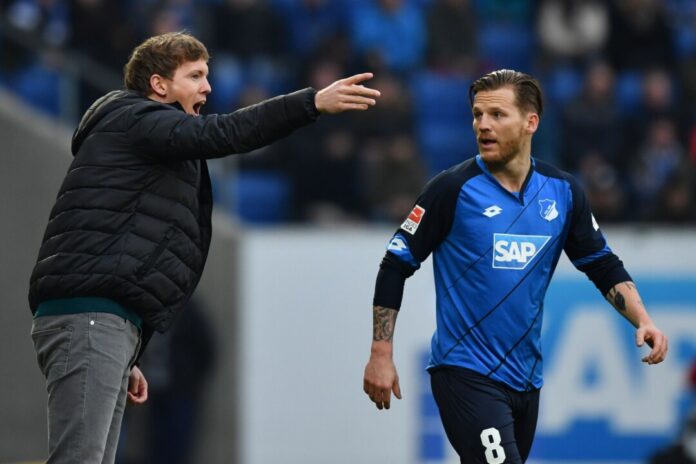 Eugen Polanski Lang ist es her: Hoffenheims Trainer Julian Nagelsmann mit seinem Spieler Polanski. (Archivbild)