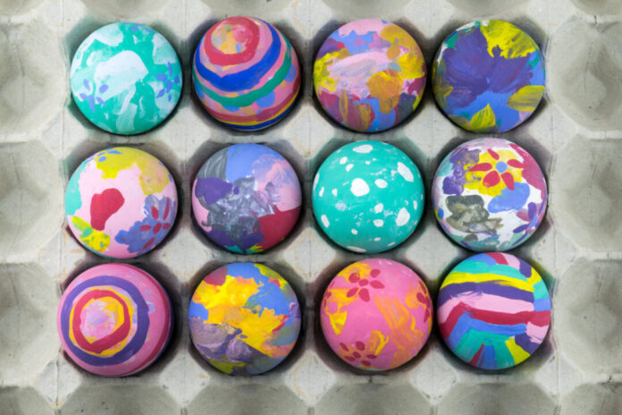 Easter eggs on wooden background. Selective focus.