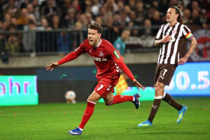 FC St. Pauli - 1. FC Köln Luca Waldschmid (l, 1. FC Köln) jubelt nach dem Ausgleichstreffer.