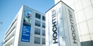 Aufstieg: Warum Hochtief jetzt in den Dax kommt Ab Montag ist der Essener Baukonzern Hochtief im Aktien-Leitindex Dax, in dem die 40 größten börsennotierten Unternehmen Deutschlands vertreten sind.