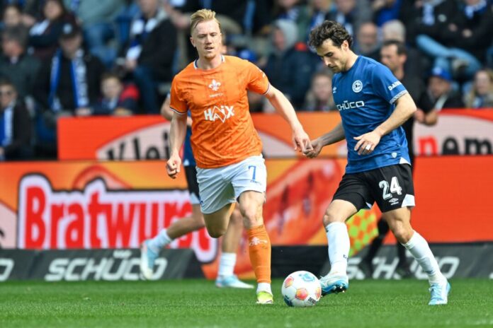 Christopher Lannert Christopher Lannert (l.): Wechsel zu den Lilien. (Archivbild)