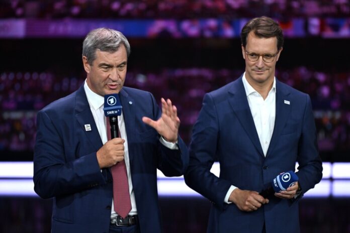 DOSB wählt deutschen Olympia-Bewerber Ministerpräsident Hendrik Wüst (r) sagt München Unterstützung zu.